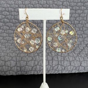 Local made earrings gold and iridescent